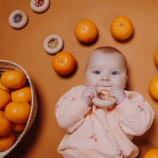 Petit Boum - Hochet sensoriel Sensory Donut oranges