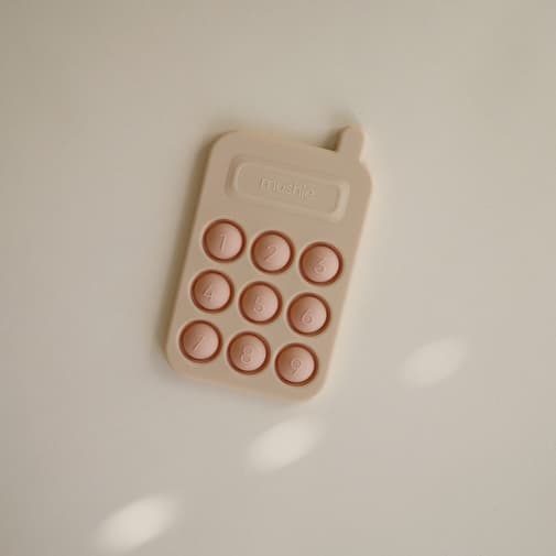 Mushie - Jouet Dentition Presse Téléphone