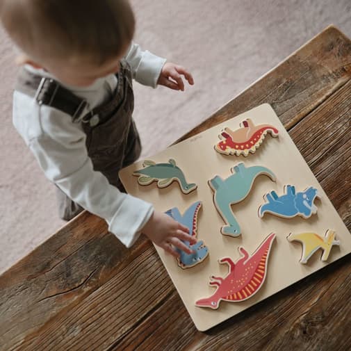 Mushie - Puzzle en bois Dino (7 pièces)