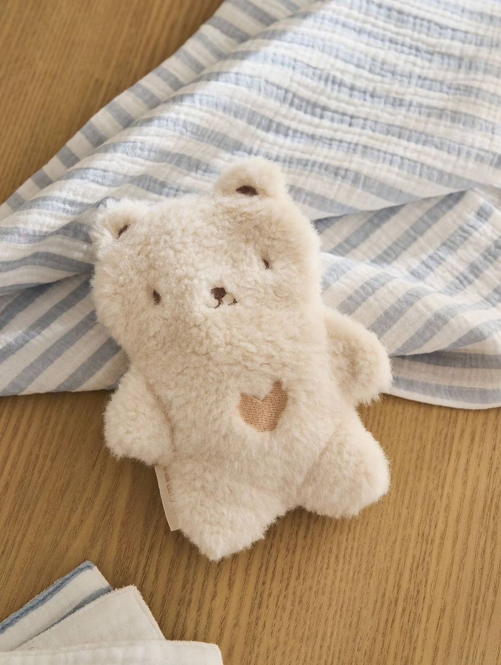 Peluche bouillotte ours blanc (Vertbaudet) - Couverture
