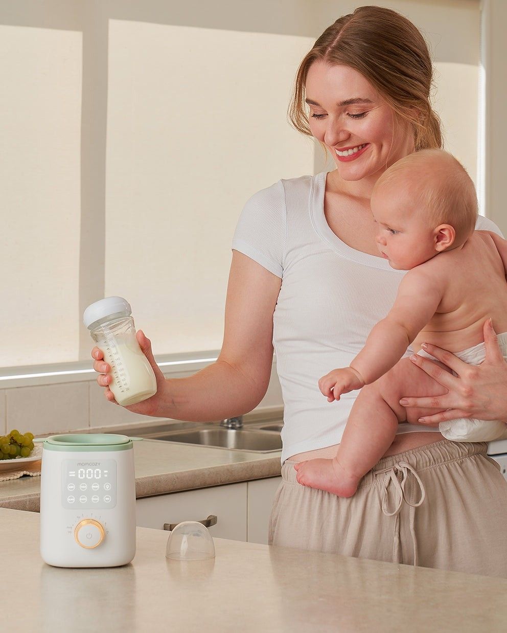 Chauffe-biberon analogique Nutri Smart (Momcozy) - Couverture