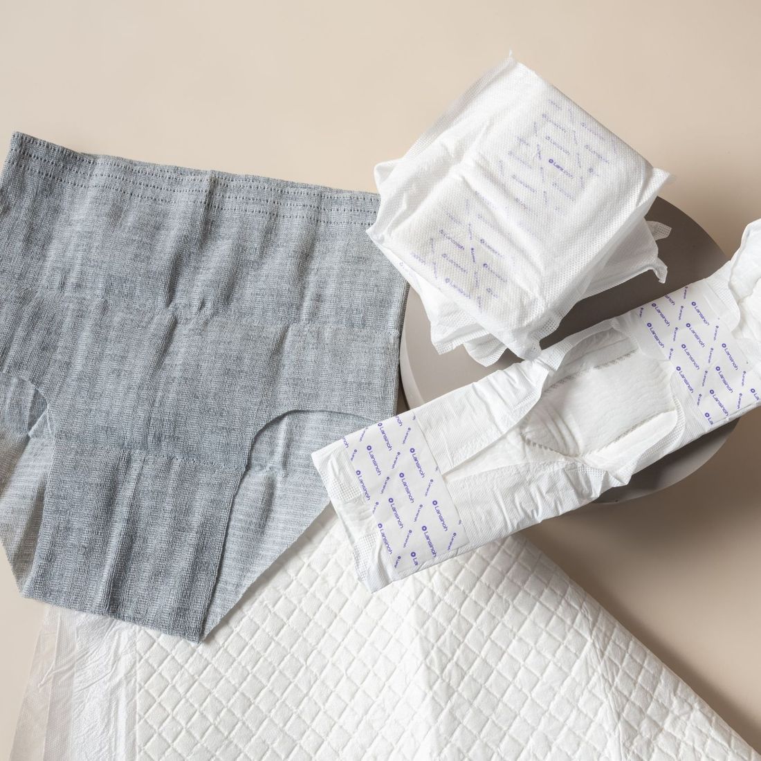 Kit de protection anti-fuites Postpartum (Lansinoh) - Couverture